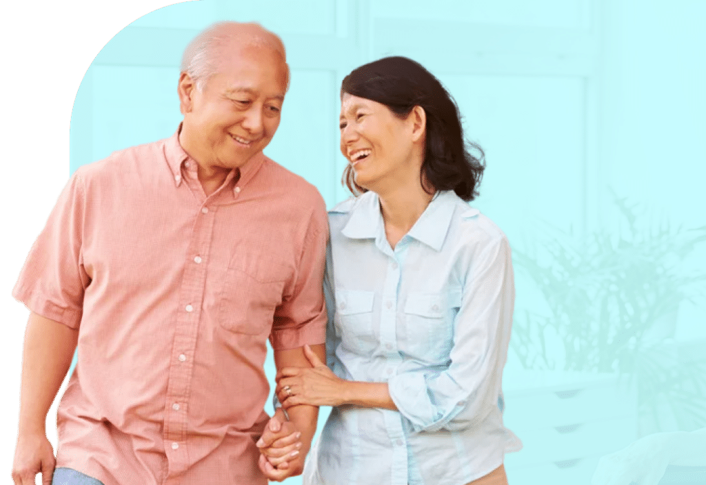 older couple walking together holding hands