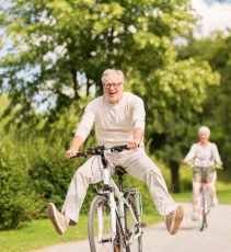 older man riding bicycle